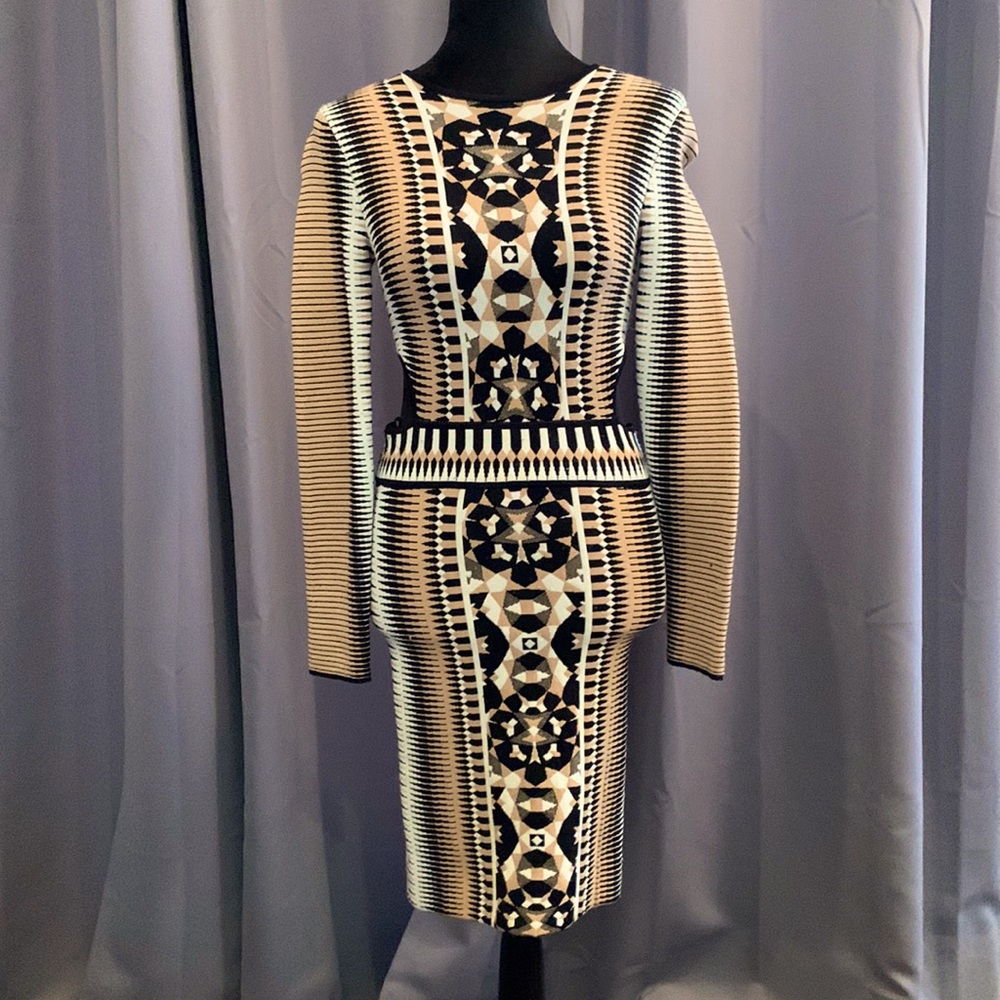 This sexy, unique high quality heavy knit dress from Ronny Kobo is one of a kind